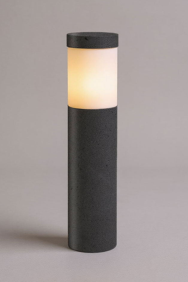 Cylindrical outdoor light fixture with a black base and top on a gray background
